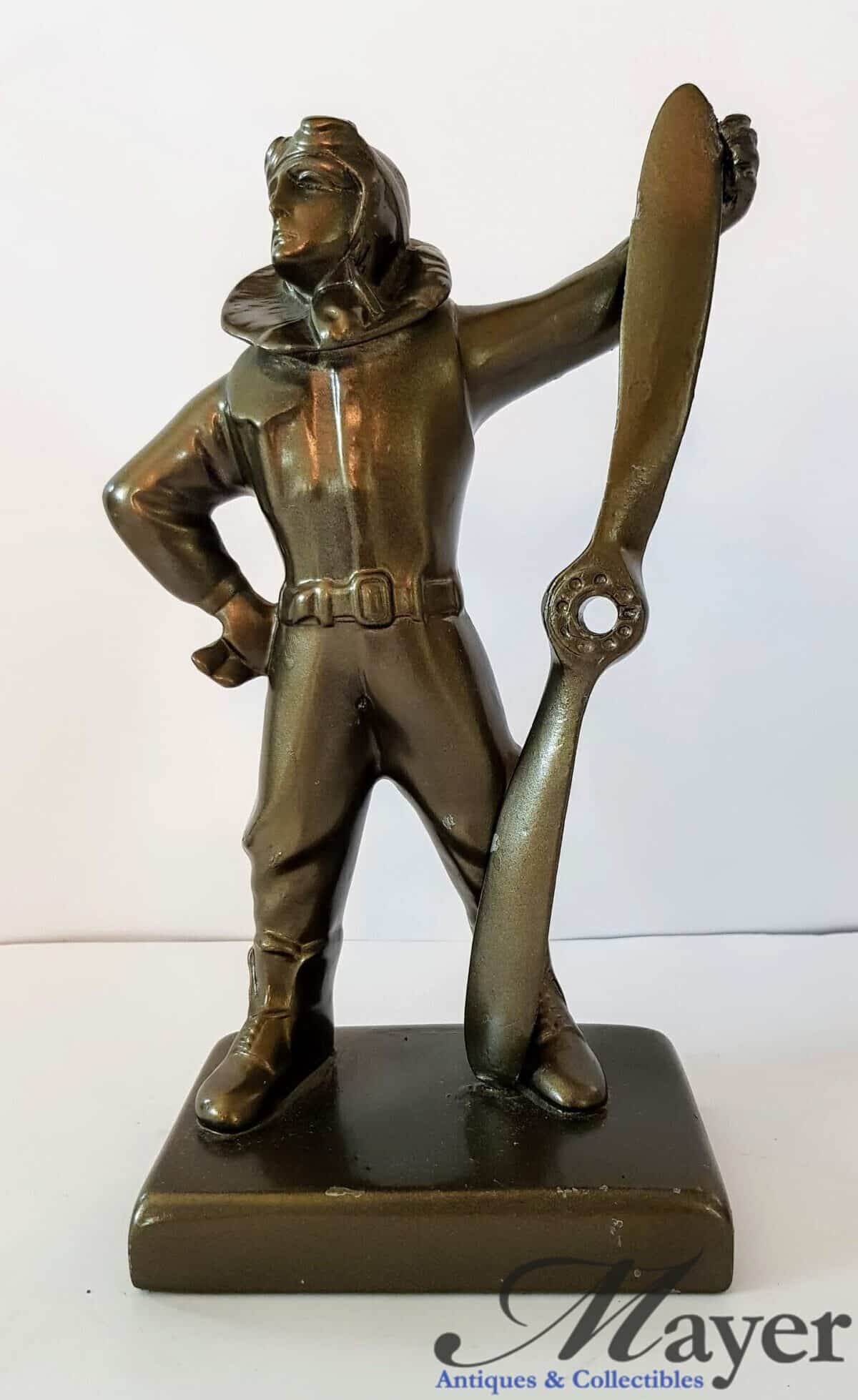 Aviator Pilot Holding A Propeller Metal Sculpture