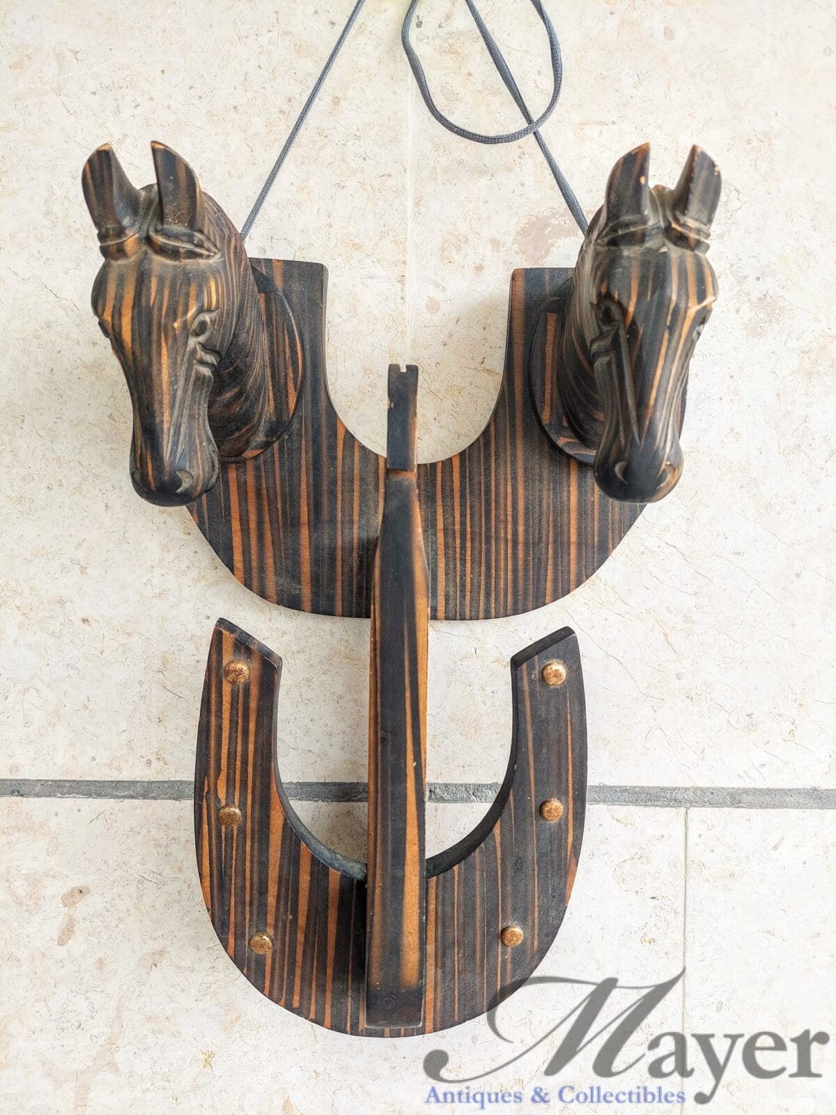 A Wooden Two Headed Horse Hanger