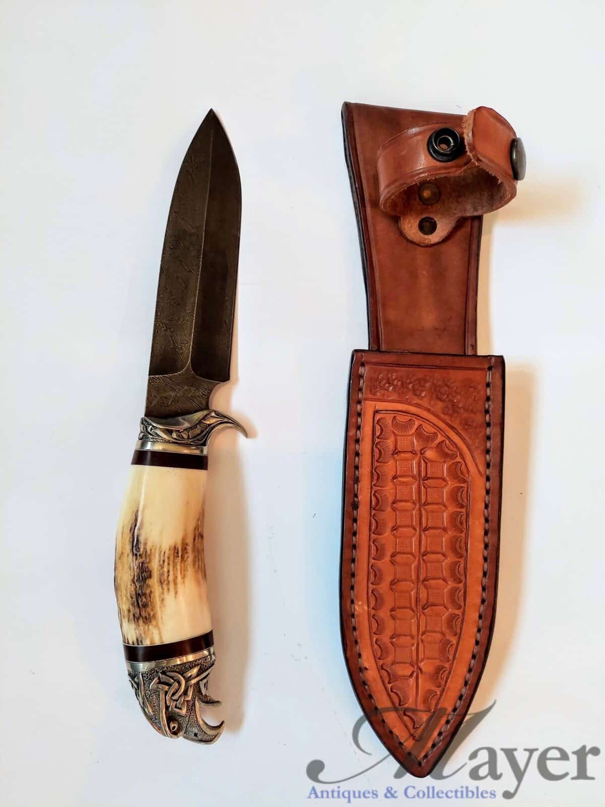 Eagle head knife with Jerry Fisk marked Damascus blade and leather scabbard signed by Alex Shamgar.